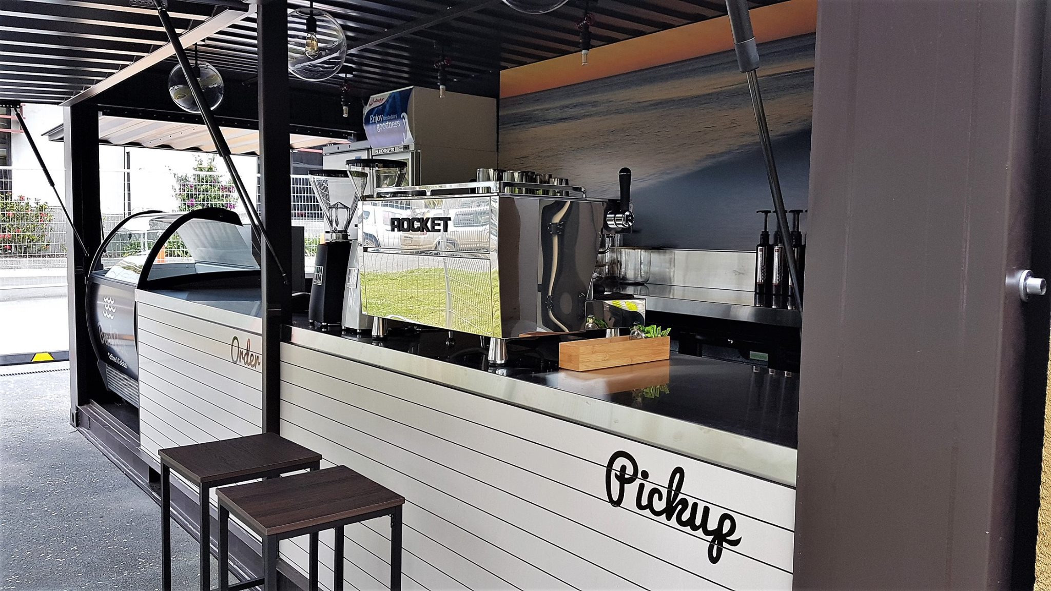 The finished BeachBox coffee counter and Rocket espresso machine ready to open