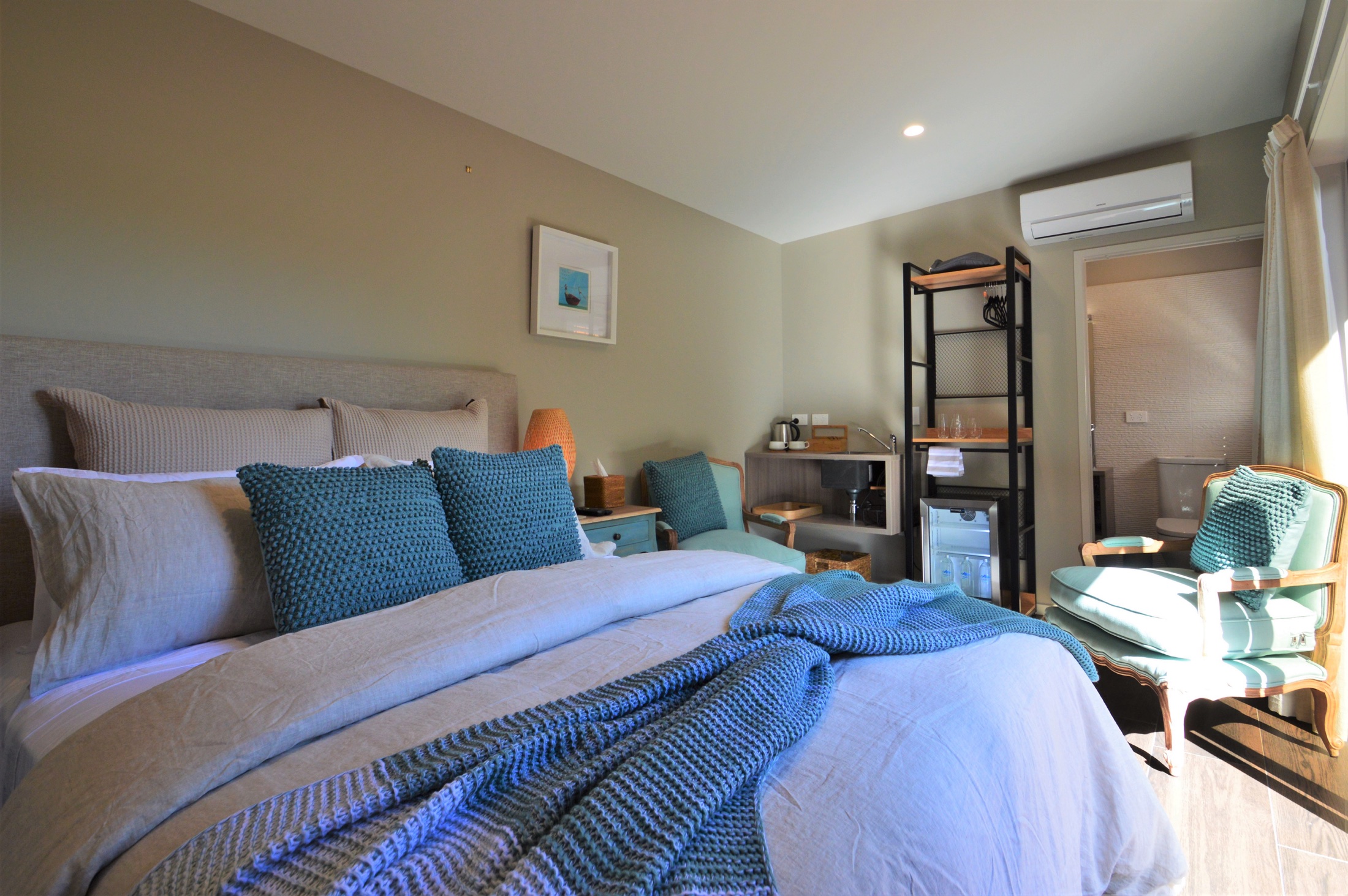 Queen bed in a BeachBox studio