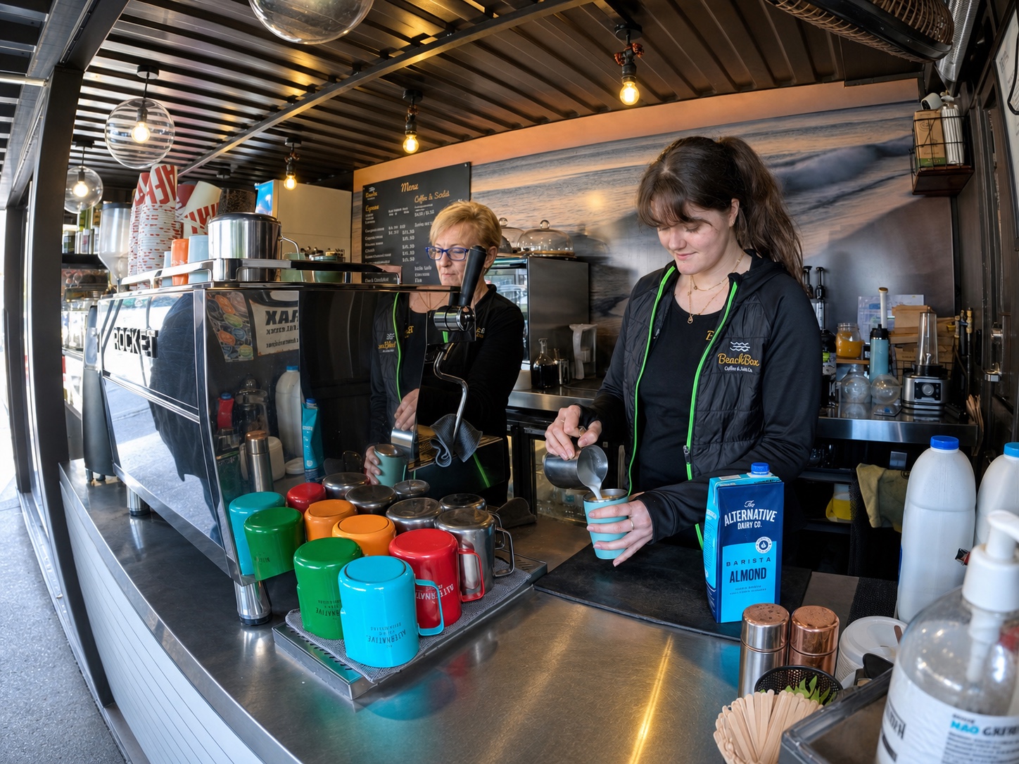 The BeachBox team preparing coffee together